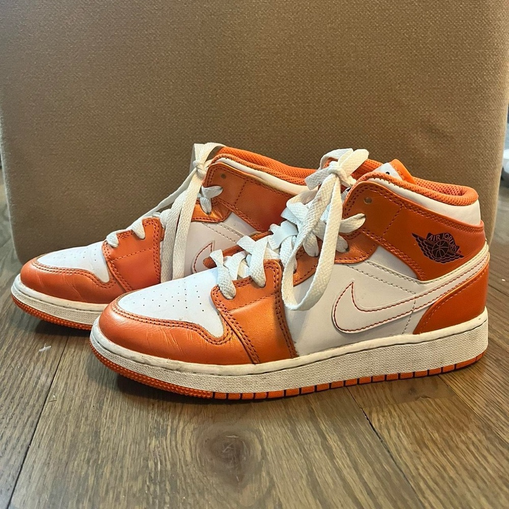 Orange and white Nike air Jordan’s. Size 5Y